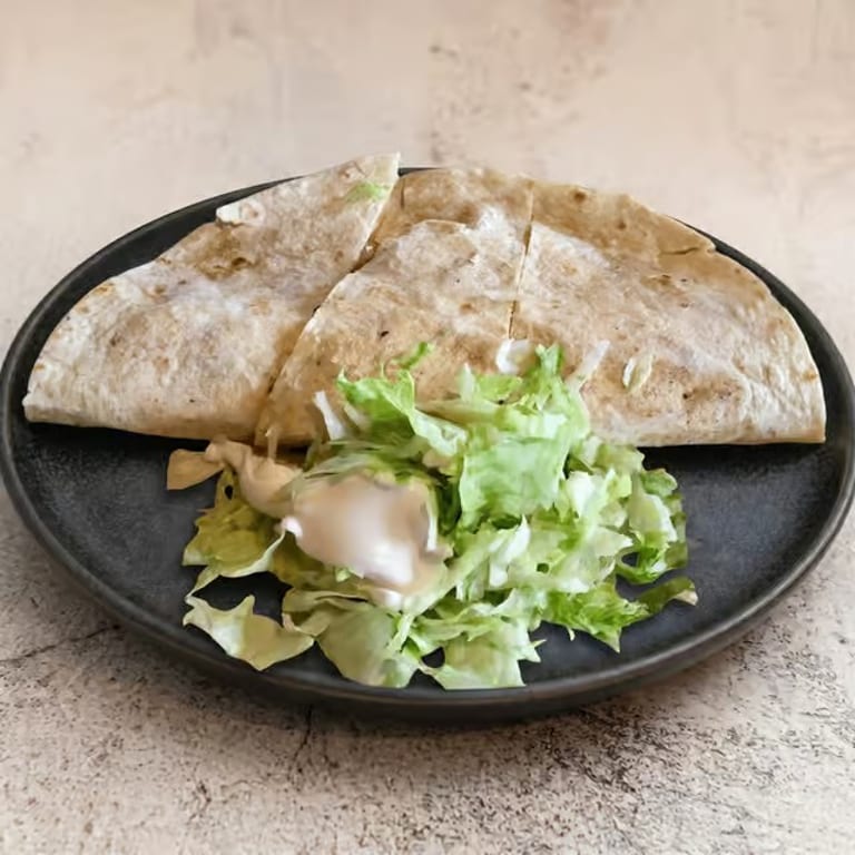 Indulge in Our Quesadilla